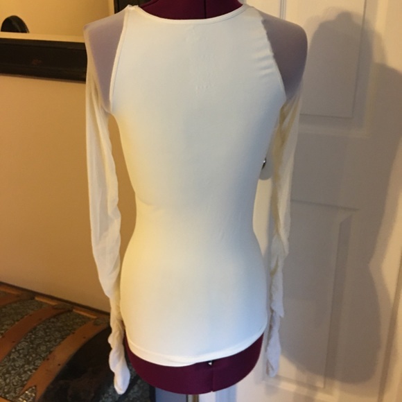 HP😊Free people seamless scrunched sleeve top. - Picture 9 of 16